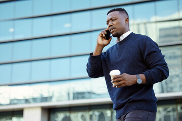 Poster - Business man talking on phone call, mobile communication with coffee in city and planning work with conversation on 5g smartphone. Frustrated and concerned employee and worker in discussion on tech