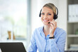 © Emily N/peopleimages.com - Contact us, customer service and telemarketing call center agent using her laptop and headset in the office. Portrait of a woman at our sales help desk job, smile and working to tell you about us
