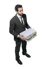 Wall Mural - Corporate businessman holding a pile of paperwork