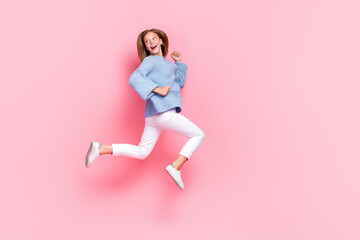 Canvas Print - Full body size photo of young beautiful funky teenager wear blue knitted sweater run fast look empty space curious isolated on pink color background