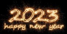2023 Sparkler Golden Number With Happy New Year Eve Greetings Bright Gold Fireworks Display Black. Dark Celebration Change Of The Year Concept Background