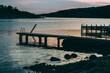 Sunset landscape with silhouetted piers in Fjallbacka, Sweden