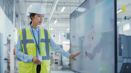 Leinwandbilder - Factory Office Meeting: Portrait of Female Chief Engineer Explaining New Work Flow for Heavy Industry Hydraulic Parts Production to Employees in a Conference Room with TV. Showing 3D Layout on Screen.