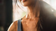 Close up Shot of a Young Adult woman's neck Sweating After Heavy Workout at Home. Successful Empowered Woman Fighting and Winning fight Against Injustices, Prejudices.