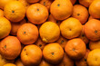 Pile of orange fresh tangerines