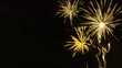 Sylvester, new year, new year's eve  2024 background banner  - Golden firework fireworks pyrotechnics on dark black night sky