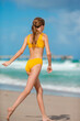 © travnikovstudio - Adorable girl have fun at tropical beach during vacation