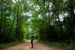 © Tandem Stock - Photographer Ian Shive observes the canopy over the Ghost Road Scenic Drive, Big Thicket National Preserve, Texas.