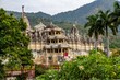 Ranakpur jain temple surrounded by mountains coveres with trees, India