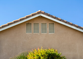 Attic ventilation window of a house, Menifee, California