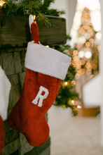 Christmas Stocking With Tree In Background