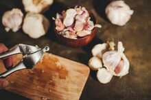 Garlic Press With Garlic Cloves