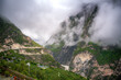 mountain village on tiger leaping gorge trek and the beautiful layer of the mountain after the rain in the clouds, Lijiang, China