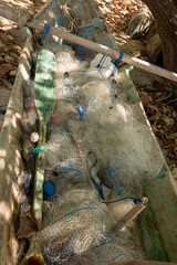 Wall Mural - a tangle of fishing nets, beach village, near Baucau city