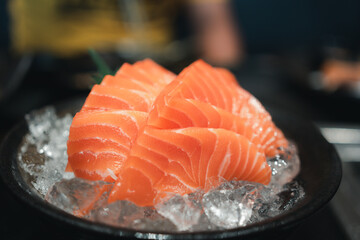 Wall Mural - Salmon sashimi slice fresh serve on ice. Japanese traditional food or with low calories and high nutrition and healthy diet dish.