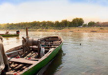 Local Fishery, Yasothorn Dam, Phanomphai Dam, Fisherman Boats Floating On Dam Background, Local Fishing, Flood Gate Dam Open For Agriculture, Boats In The River, Local Fisherman Village Thailand.