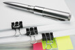 © korey - Pen on the stack of documents with paper clip folder