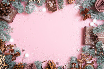 Wall Mural - Pine tree branches, garland and Christmas decoration on colored background with copy space. New Year Xmas greeting card