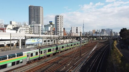 Canvas Print - Landscape view from above view to Japan railway train JR trackway in daytime winter with trains running on the railway. Shinkansen- super-high-speed train