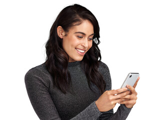 png shot of a young woman using her cellphone while standing against a grey background