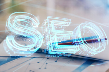 Poster - Double exposure of table with computer and seo drawing hologram. Search optimization concept.