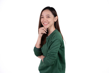 Young beautiful smiling good mood positive girl pointing finger in copyspace isolated on white background.