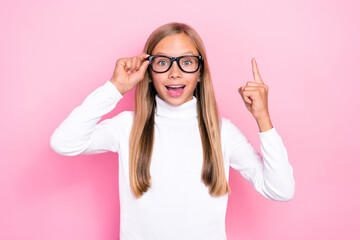 Sticker - Portrait of smart candid schoolchild point finger excellent brilliant idea isolated on pink color background