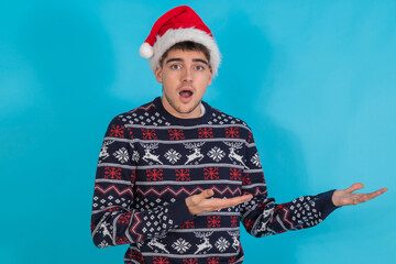 Wall Mural - isolated young man with christmas clothes