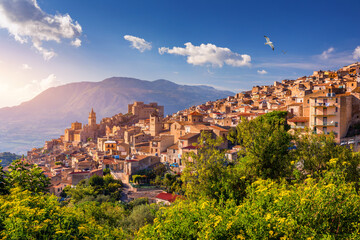 Wall Mural - Caccamo, Sicily. Medieval Italian city with the Norman Castle in Sicily mountains, Italy. View of Caccamo town on the hill with mountains in the background, Sicily, Italy.