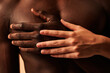 © ADDICTIVE STOCK - Crop couple touching hands in studio