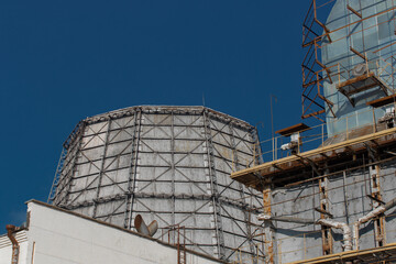 Wall Mural - Cooling of hot salt water in steam units of the cooling tower of an industrial enterprise