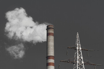 Wall Mural - The pipe of the industrial plant emits toxic grey smoke into the atmosphere sky and air. Pollution of the environment and ecology. Thermal power plant power lines high voltage