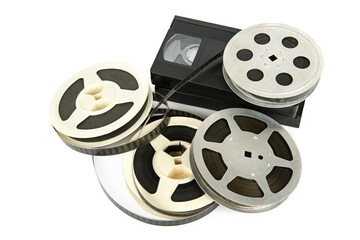 Wall Mural - Film reel and videotape isolated on white background.