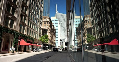 Wall Mural - People and traffic move along the downtown city streets of Dallas Texas USA