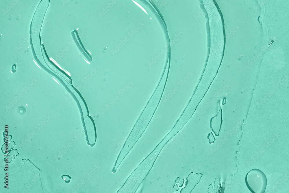 Texture of cosmetic product on mint background