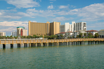 Wall Mural - Boardwalk over the lake with brackish water near the buildings in Destin, Florida