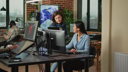 Poster - Diverse women brainstorming ideas to develop artistic content, working together to create 3d render interface on software. Creative agency workers planning new infographics project on pc.