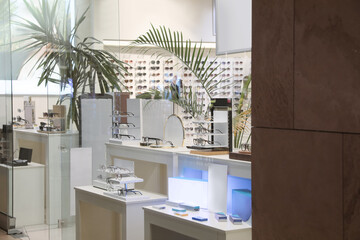 Showcase with different glasses in optical store