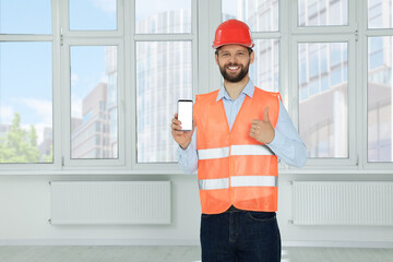 Poster - Man in reflective uniform with phone indoors