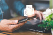 © chaylek - man reading electronic mail from smartphone,Email marketing and newsletter concept,Digital communication with email messages,Sending and receiving messages online with the email icon