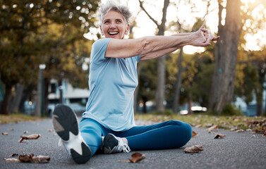 Canvas Print - Fitness, park and stretching senior woman on ground in workout, training and energy for body wellness, outdoor healing and mental health. Elderly athlete, sports warm up and cardio exercise in nature