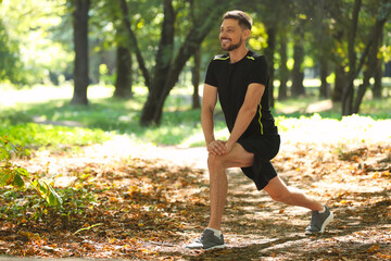 Sticker - Handsome man doing morning exercise in park, space for text