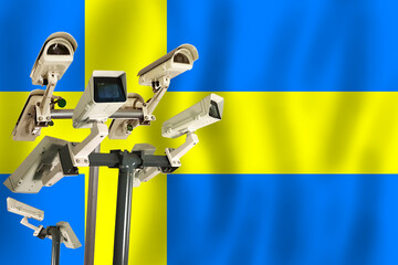  Swedish CCTV camera on the flag of Sweden. Surveillance, security, control and totalitarianism concept