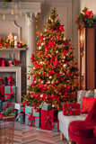 Fototapeta  - Happy new year interior christmas background. Red Decorated glowing tree with gifts box, fireplace with candles sunlight