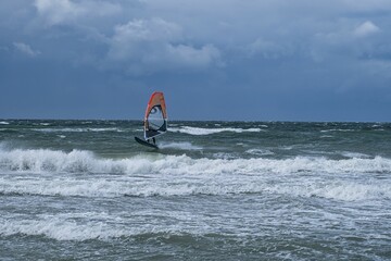 Sticker - surfer in action in the sea