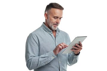 png studio shot of a mature man using a digital tablet against a grey background