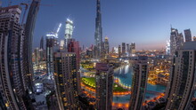 Panorama Of Dubai Downtown Cityscape With Tallest Skyscrapers Around Aerial Night To Day Timelapse.