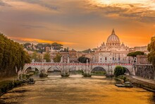 Saint Peter"s Basilica And The Santangelo Bridge In The Golden Eveing Light