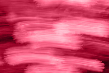 Trendy color of the year 2023. Abstract background toned in viva magenta color