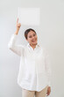 © littlestocker - Happy asian woman holding white board. Advertising copy space